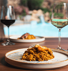 Plato de arroz con vino en Aguadulce Pool Club