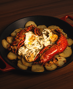 huevos rotos con bogavante